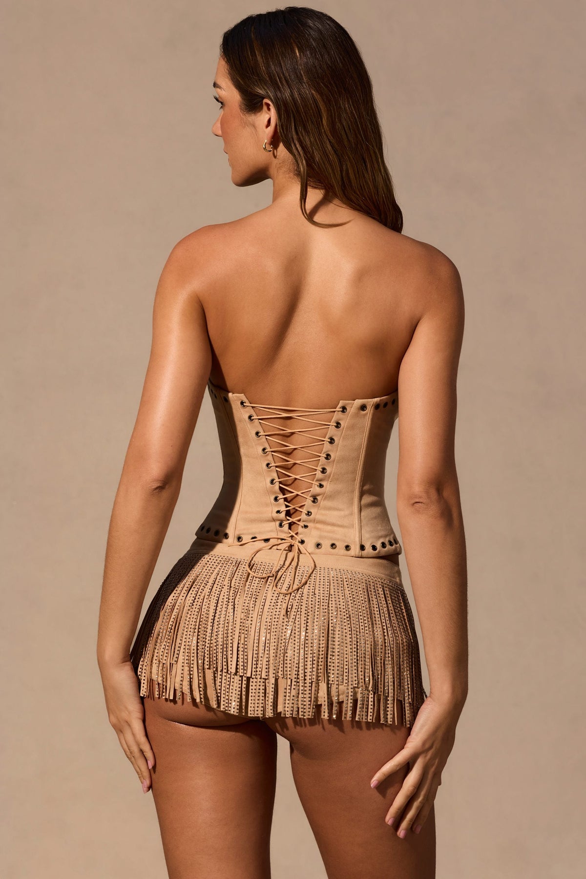 Meliora Fringed Low-Rise Mini Shorts in Tan