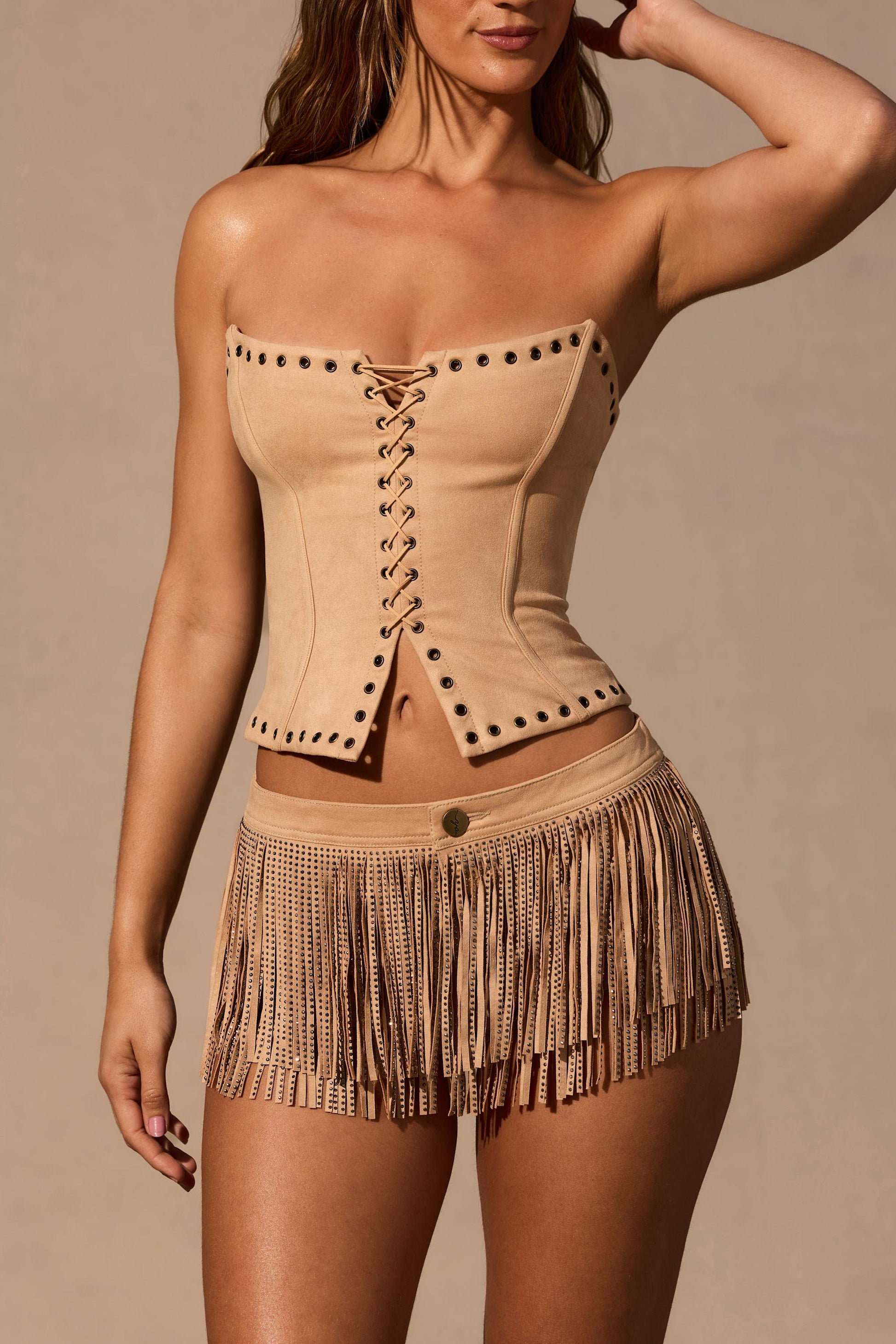 Meliora Fringed Low-Rise Mini Shorts in Tan