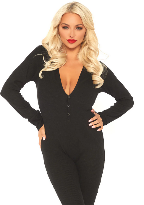 Close-up of black thermal long john pajamas showing fabric texture and snap button details

